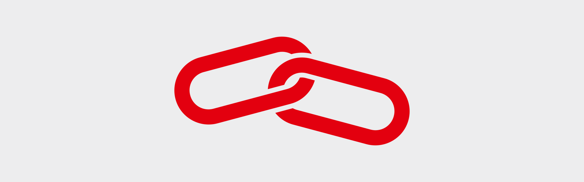 Zwei ineinander greifende Kettenglieder als Symbol für einen Link.